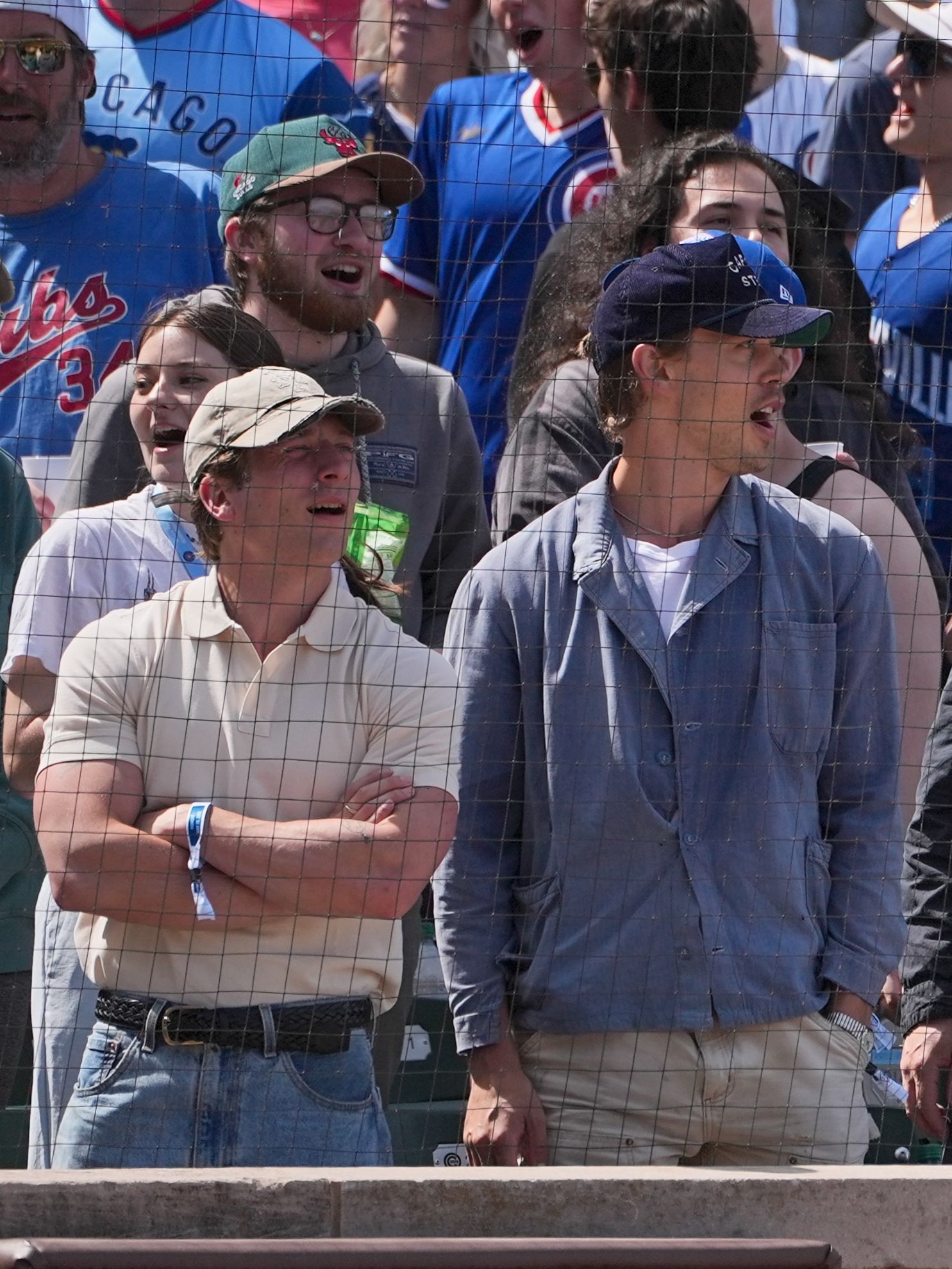 Image may contain David Harbour Austin Butler Baseball Cap Cap Clothing Hat People Person Accessories and Glasses