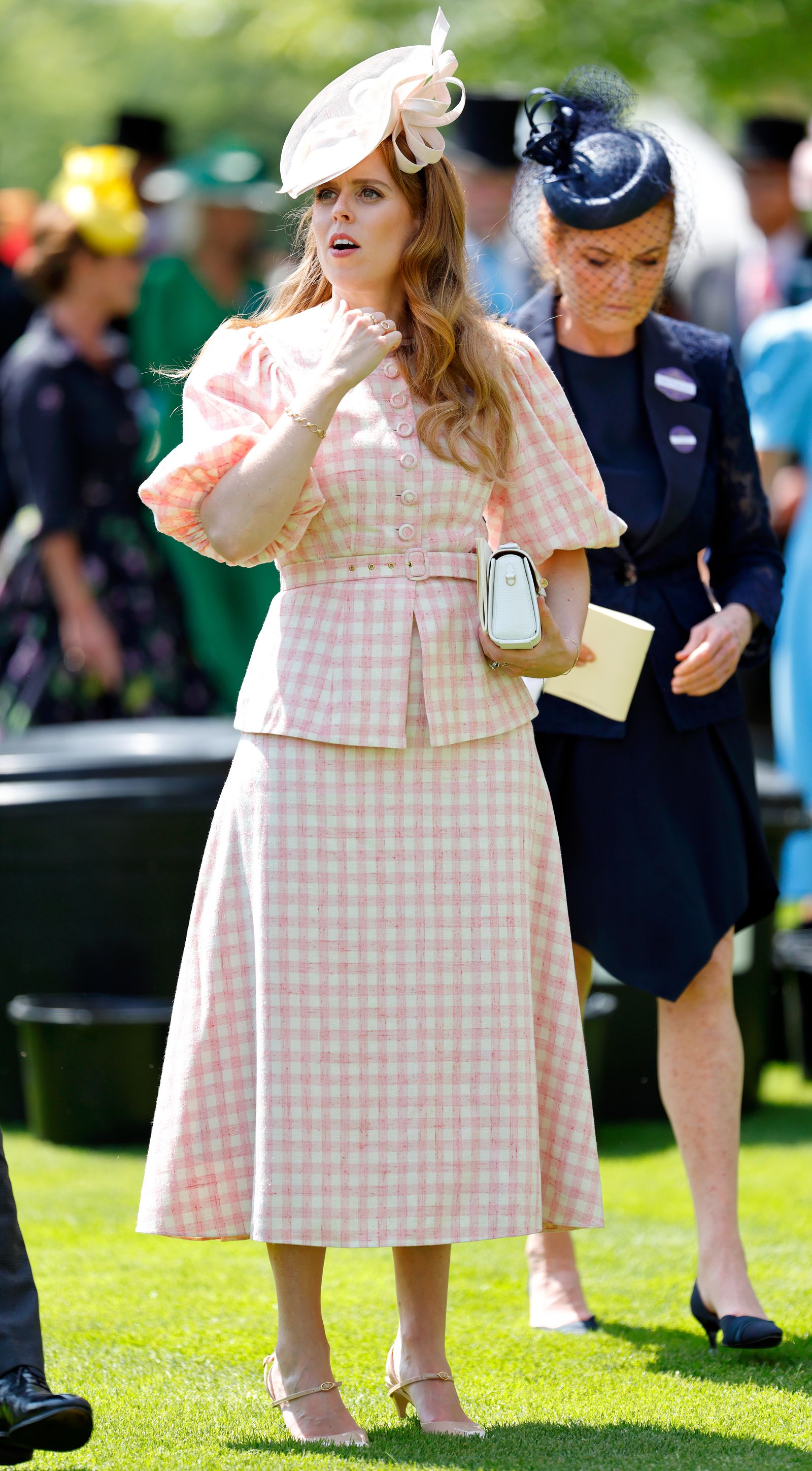 Image may contain Sarah Duchess of York Carlos Hyde Person Head Face Adult Child Accessories Bag and Handbag