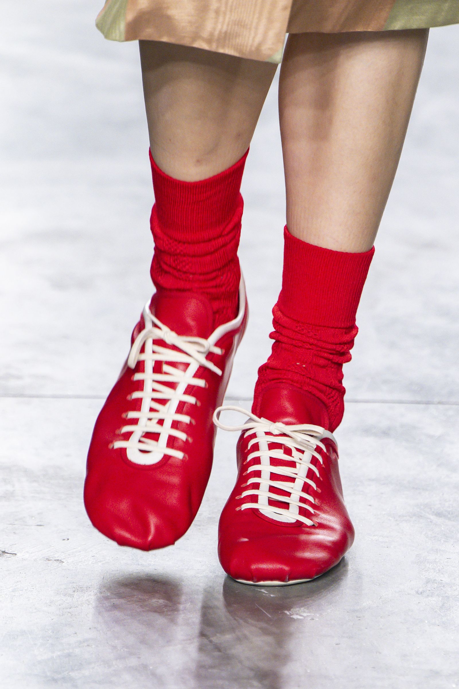 Image may contain Clothing Footwear Shoe Sneaker High Heel Person Hosiery and Sock