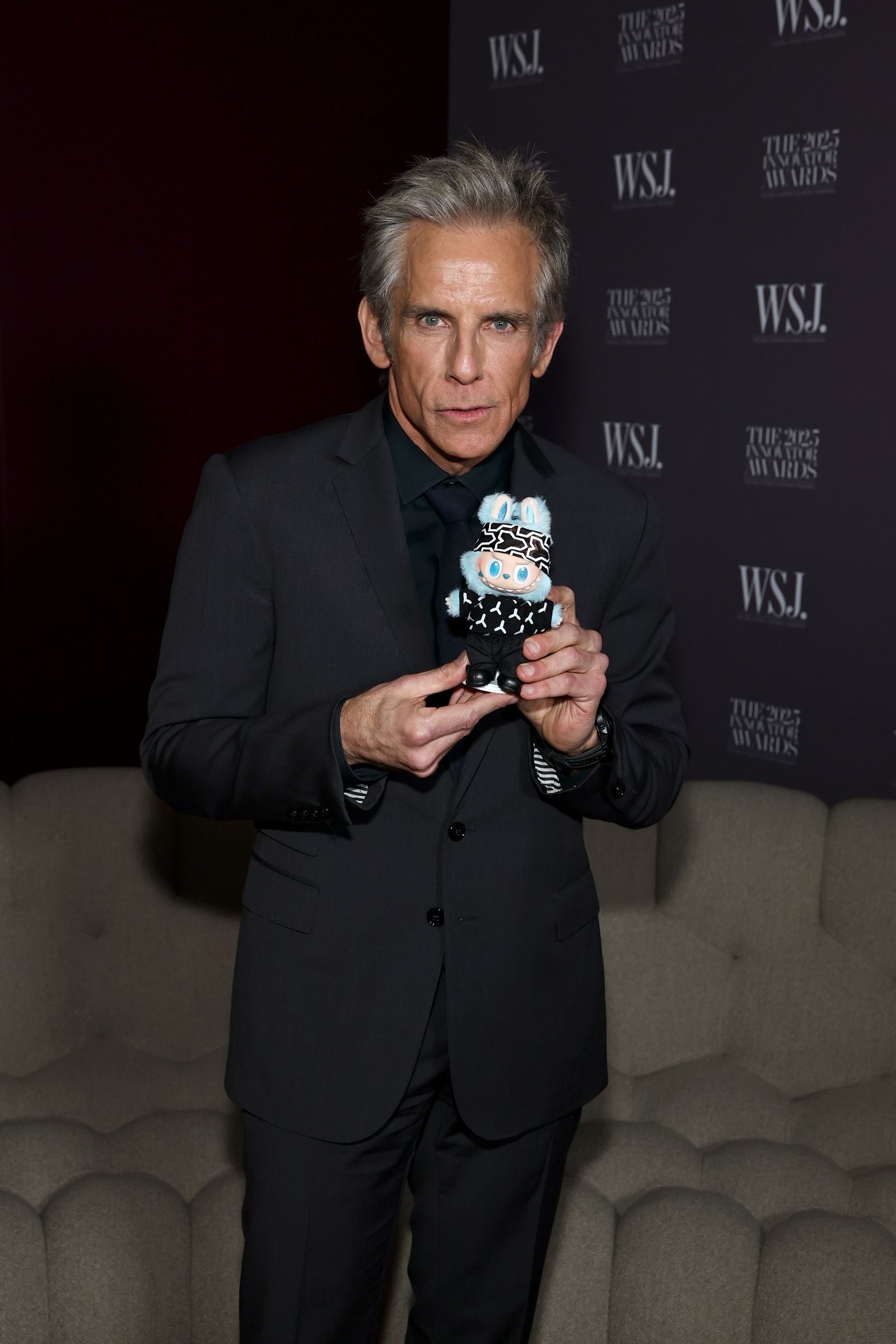 Image may contain Ben Stiller Face Head Person Photography Portrait Blazer Clothing Coat Jacket and Adult