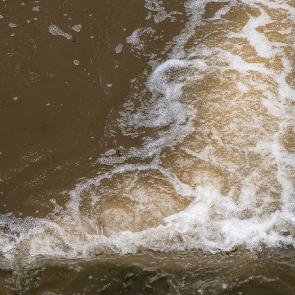 Changes in water coloration in the creeks near the Westmoreland Sanitary Landfill in southwestern Pennsylvania.