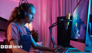 Concentrated teenage girl gaming