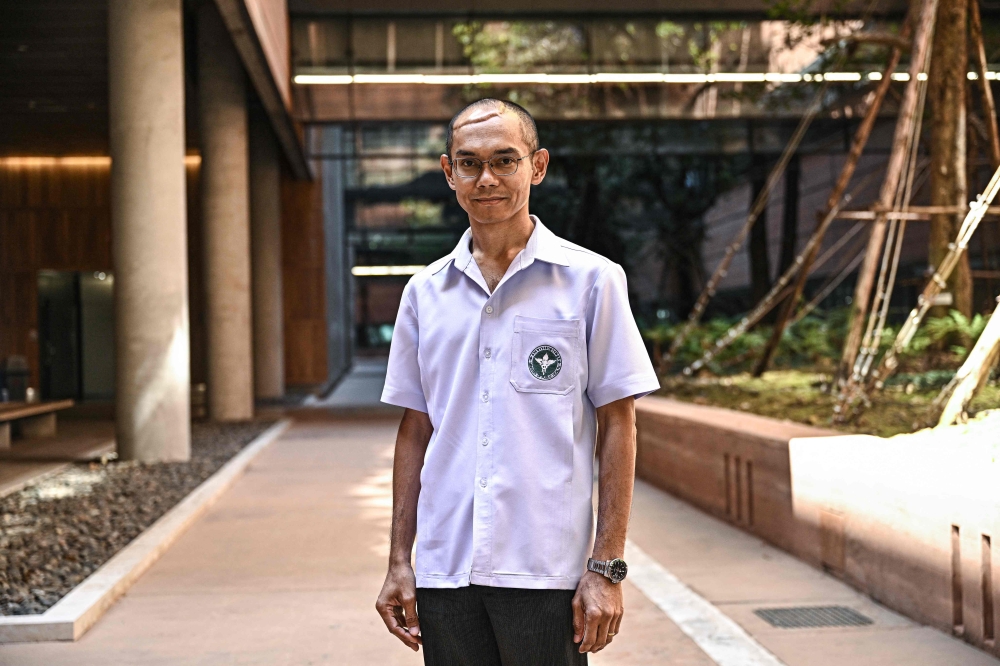 Dr Wirun Limsawart, co-founder of the Thailand Clean Air Network, at Thailand’s Parliament in Bangkok on December 4, 2025. — AFP pic
