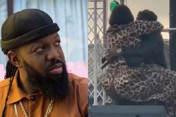 Watch as Timaya 'falls' on stage while lifting plus-sized lady during performance