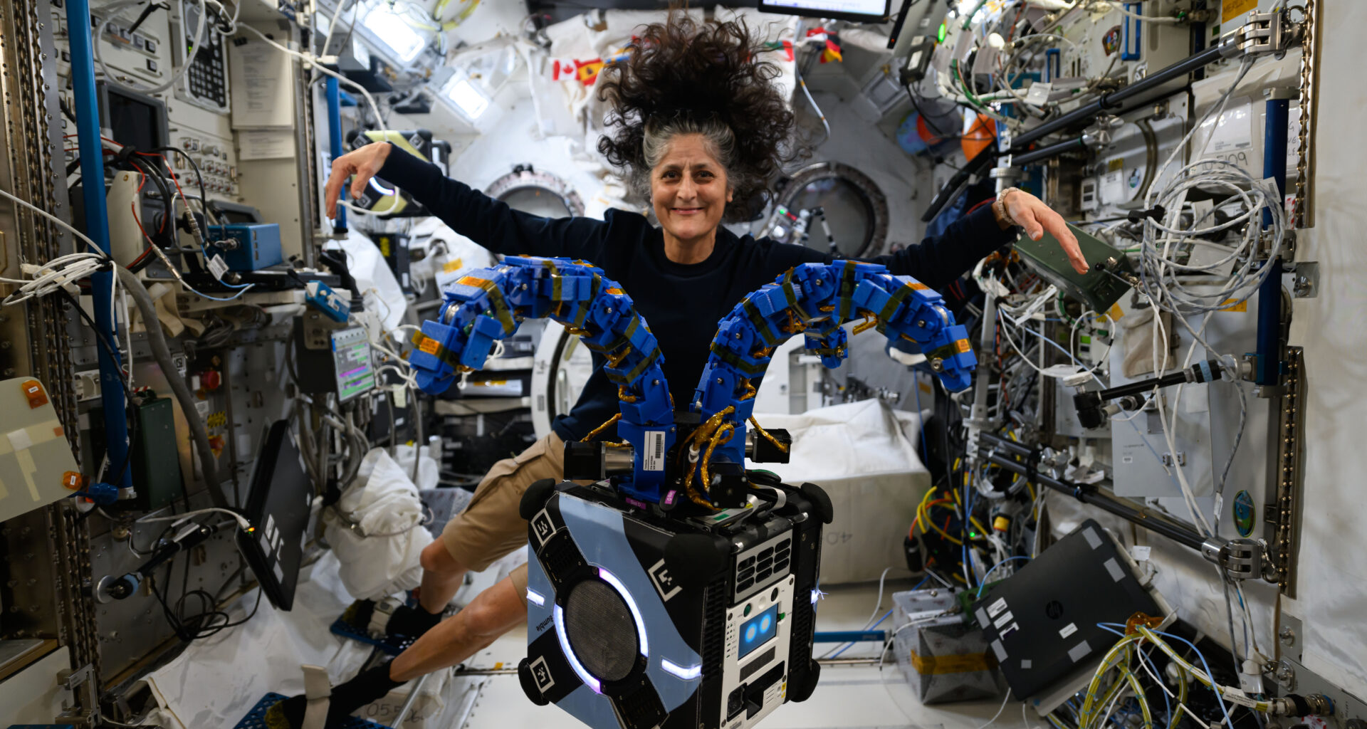 NASA astronaut and Expedition 72 Commander Suni Williams onboard space station with the Astrobee robotic free-flyer in the Kibo laboratory module.