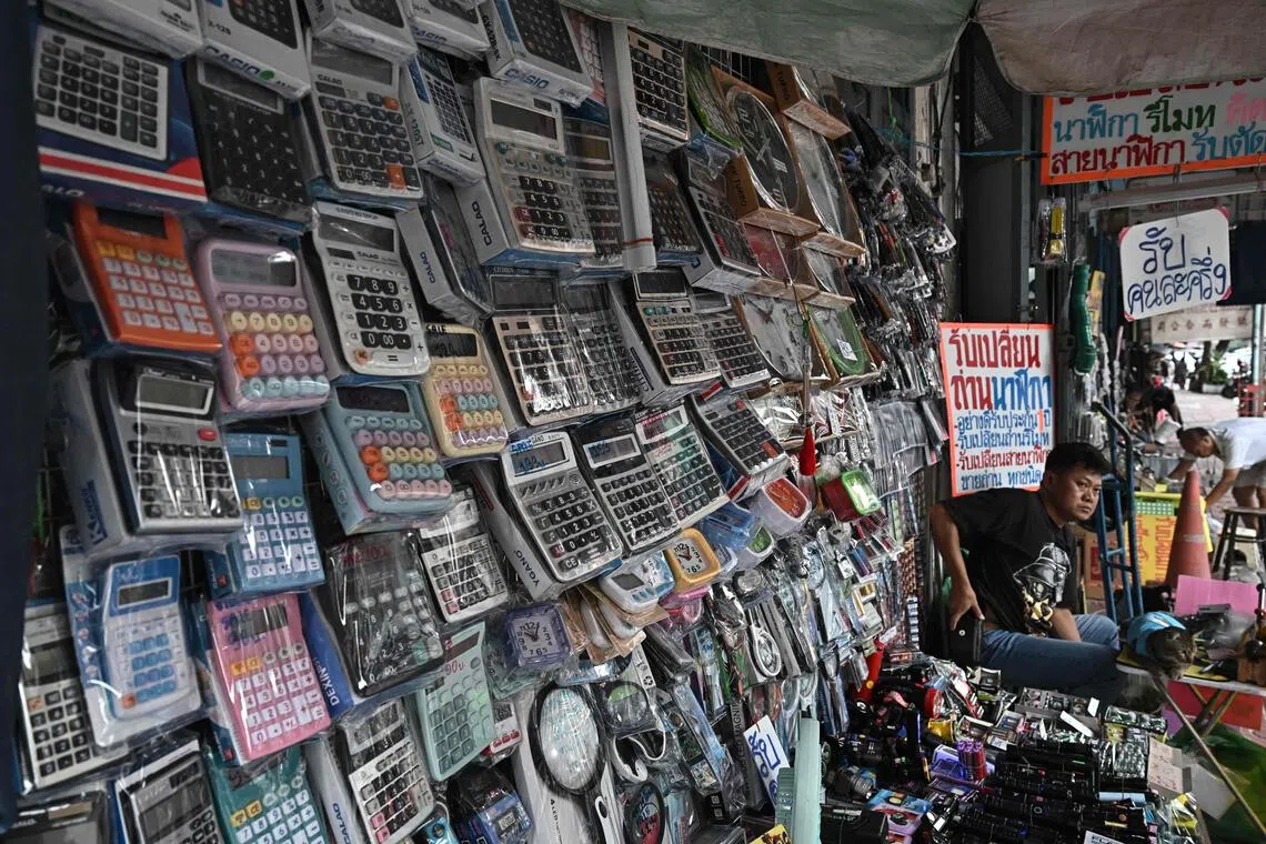 This photo taken on Nov 18 shows calculators for sale in a market in Bangkok.