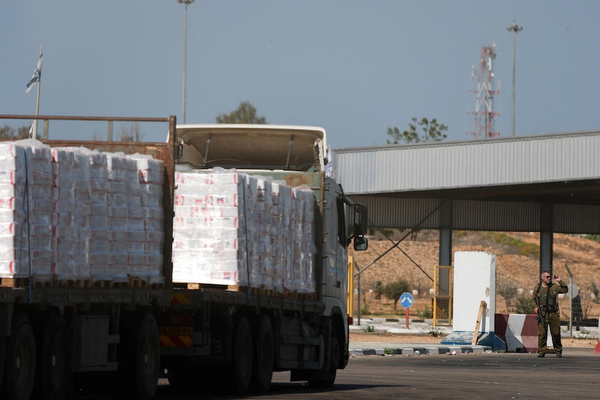 Trucks carrying aid