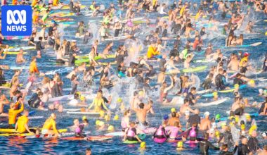 In pictures: Thousands honour Bondi victims in emotional paddle-out tribute