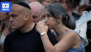 In pictures: Thousands honour Bondi victims at emotional beachside memorial