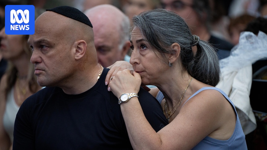 In pictures: Thousands honour Bondi victims at emotional beachside memorial