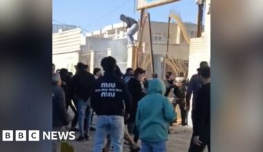 Iran protesters try to break into government building as unrest continues