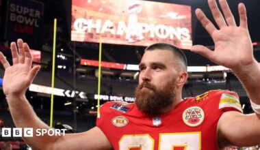 Travis Kelce waves to fans after the Kansas City Chiefs beat the San Francisco 49ers in the Super Bowl in 2024