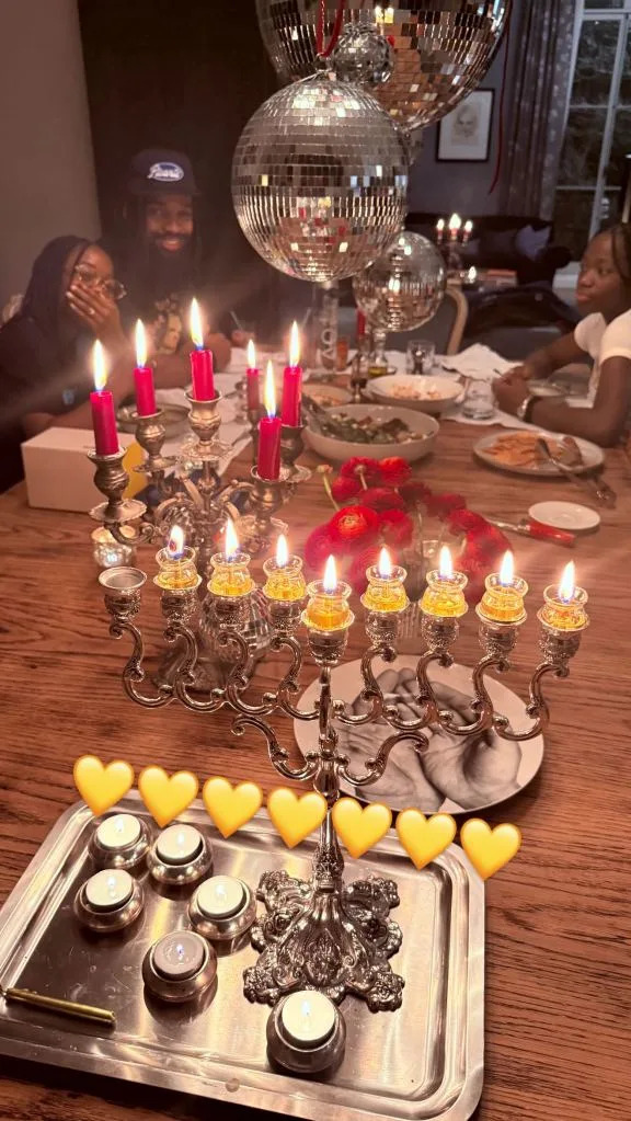 The “Vogue” songstress also shared a photo of her Hanukkah celebration with her much-younger boyfriend, Akeem Morris, and her kids. Madonna/Instagram