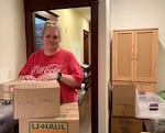 Heather Murdoch-Medema packs up her apartment in Seaside, Ore. on Oct. 30, 2025.