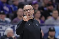 Dallas Mavericks head coach Jason Kidd calls out a play against the Sacramento Kings during...