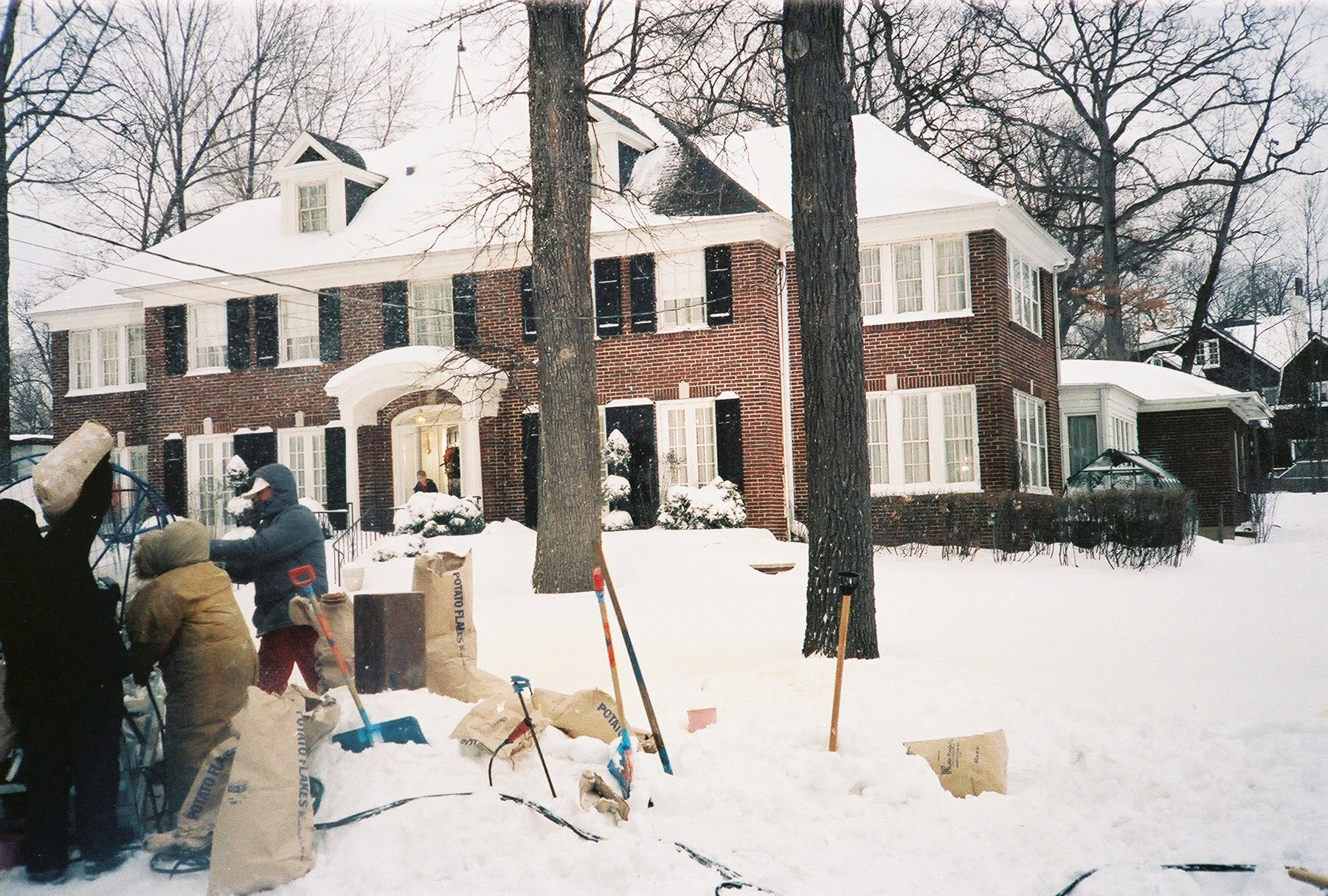 The 'Home Alone' crew using potato flakes to simulate snow outside the house in Winnetka