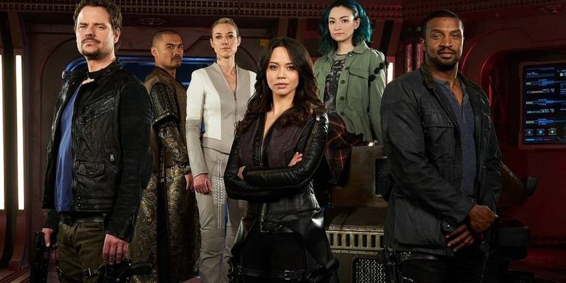 The lead ensemble of Dark Matter standing in a spaceship