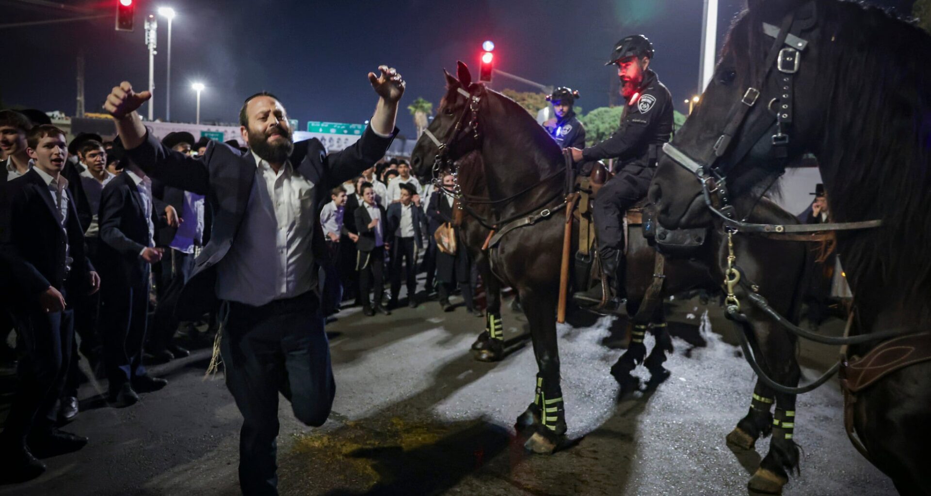 Haredi anti-draft protesters block highway; driver arrested for hitting teen