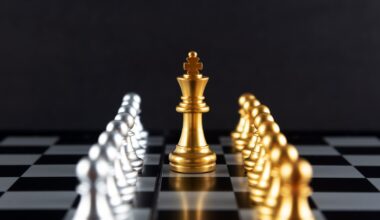 Golden Chess King and Pawn with Silver Colored Pawns on the sides