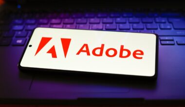 The Adobe Inc. logo displayed on a smartphone screen.