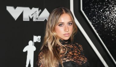 Tate McRae Wears Nothing But Pink Lacy Lingerie and Floor-Length Hair