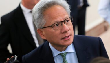 Nvidia’s CEO says AI adoption will be gradual, but we still may all end up making robot clothing