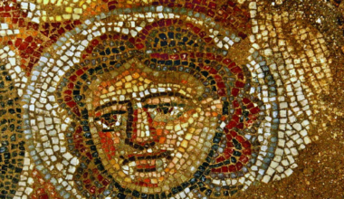 A brightly colored mosaic of a female face.