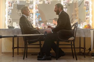 Jay Kelly. (L-R) George Clooney as Jay Kelly and Adam Sandler as Ron Sukenick on the set of Jay Kelly. Cr. Peter Mountain/Netflix © 2025.