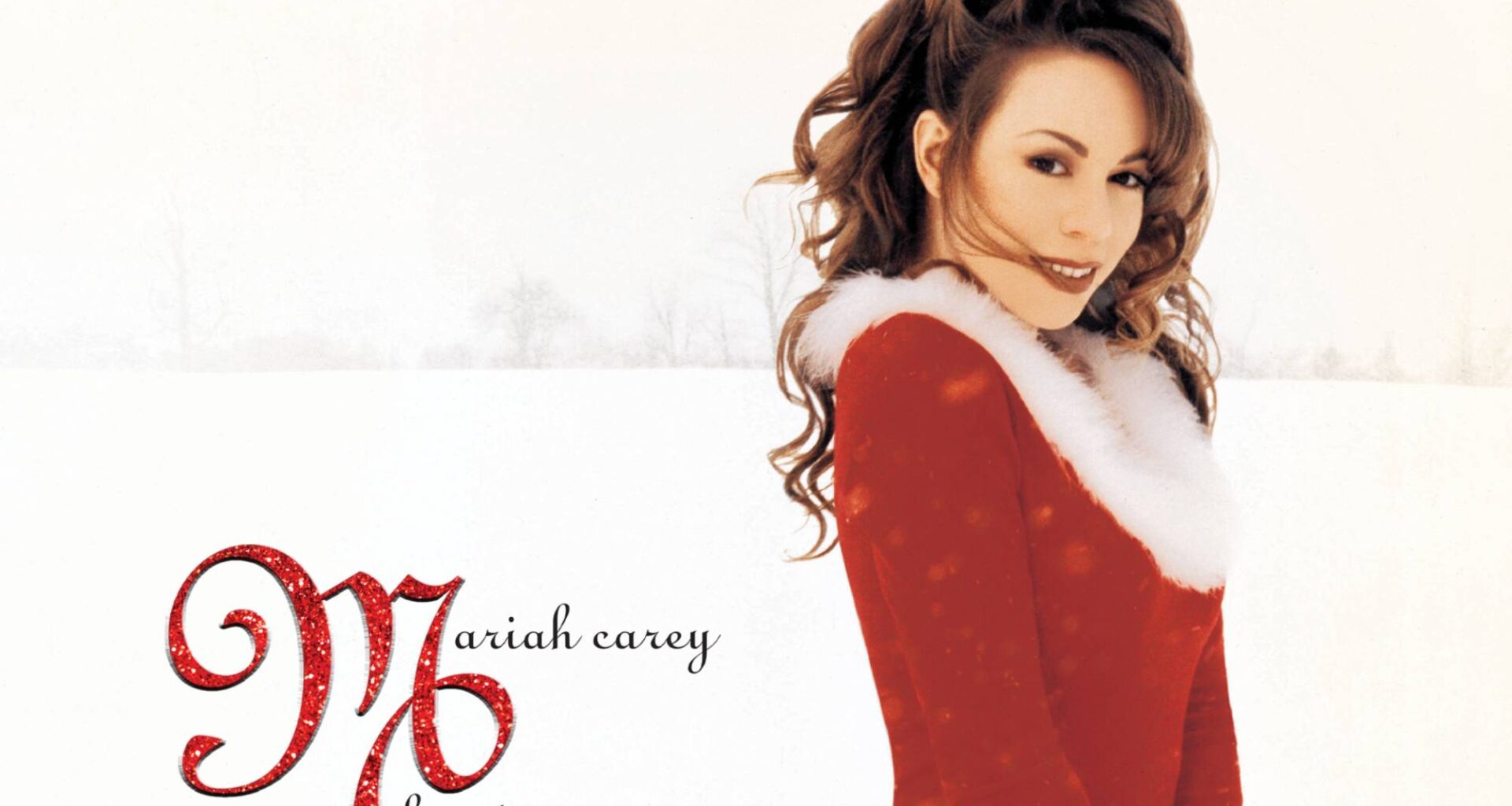 Mariah Carey reacts to 'All I Want For Christmas Is You' breaking record for longest-running Number One