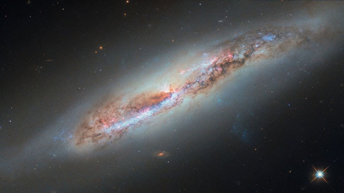 NASA reveals a fresh Hubble Space Telescope image of the spiral galaxy NGC 4388