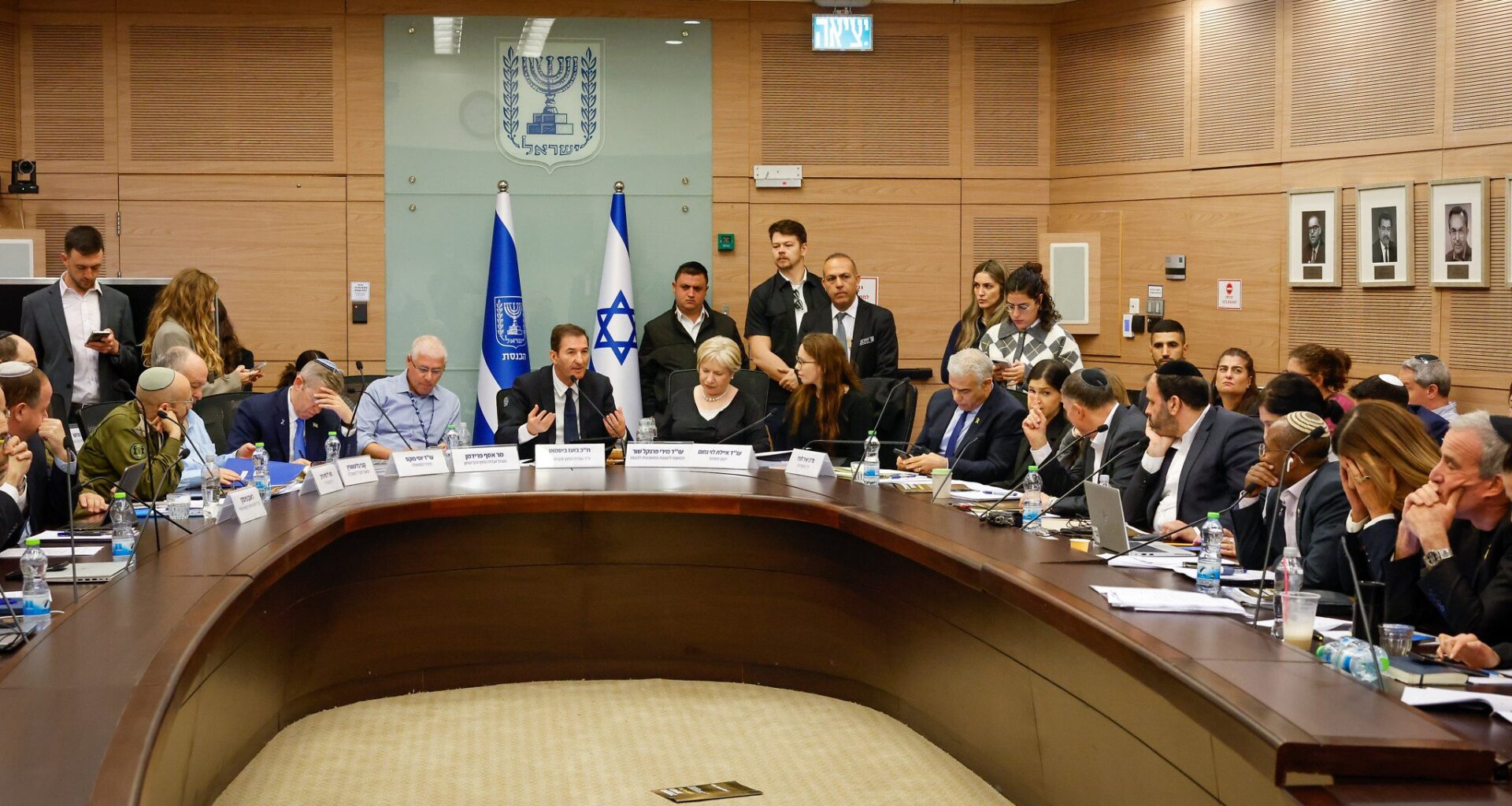 Coalition MKs tear into Haredi draft exemption bill, throwing it into uncertainty