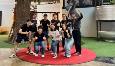 Simular team surrounds co-founder Ang Li (top row center)