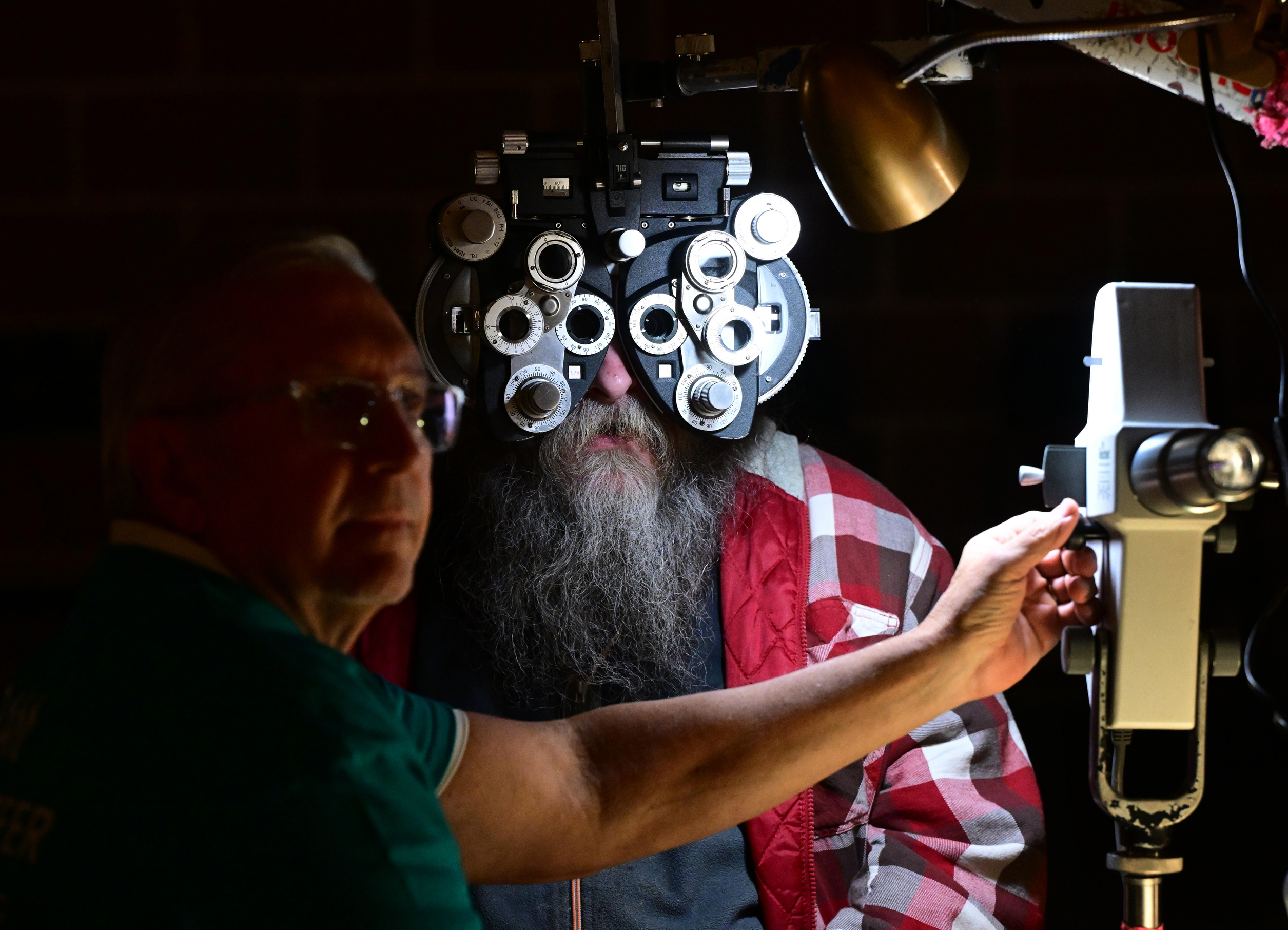 Optomotrist Dr. Ed Zikoski of Montgomery County, gives Sean Griffith...