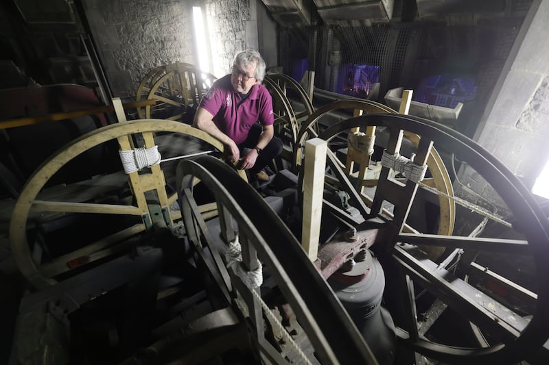 Raymond Cregan, master bell ringer at Christ Church Cathedral, inspecting the belfry. Photograph: Alan Betson
