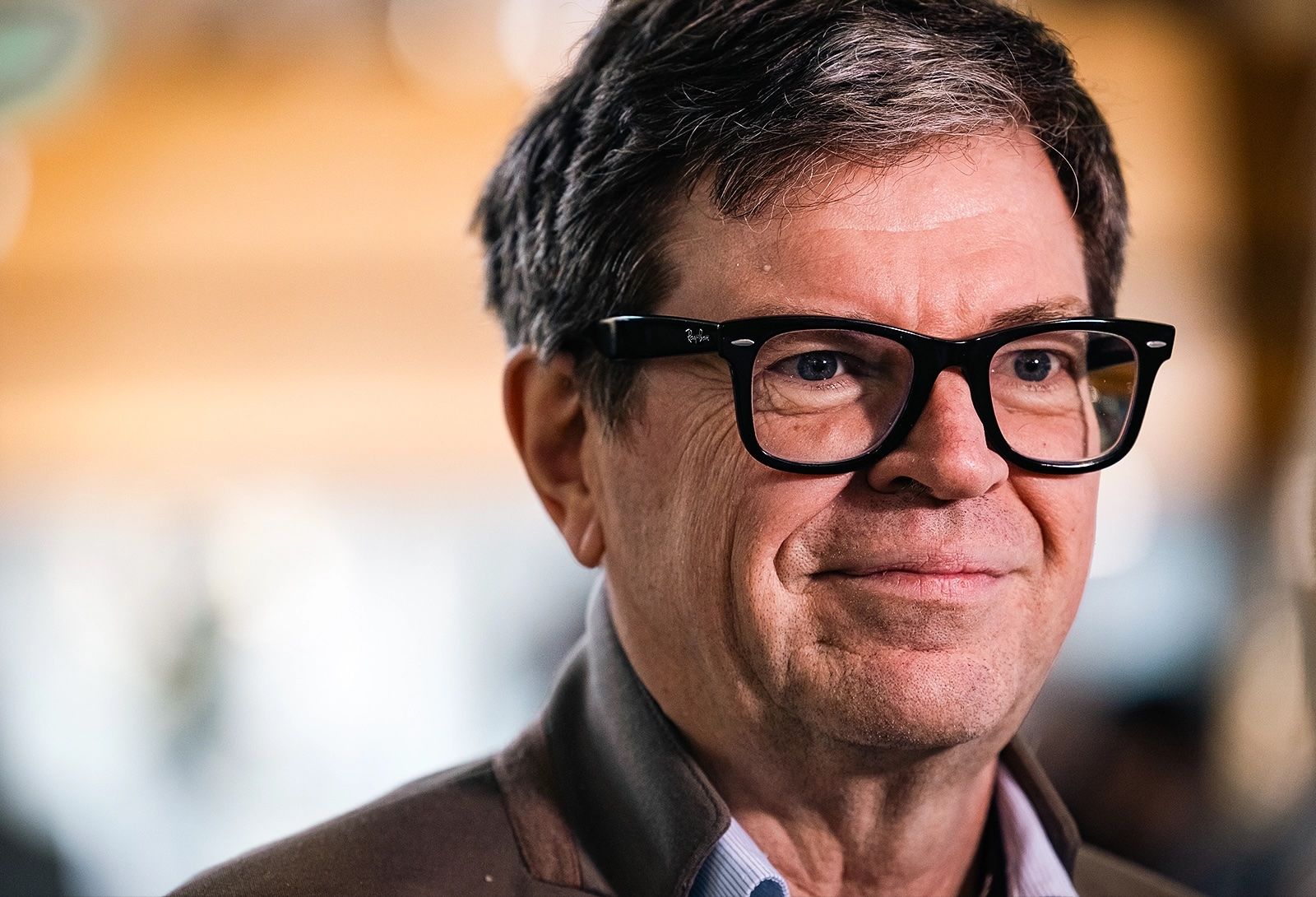 Image may contain Yann LeCun Face Happy Head Person Smile Photography Portrait Dimples Adult and Accessories