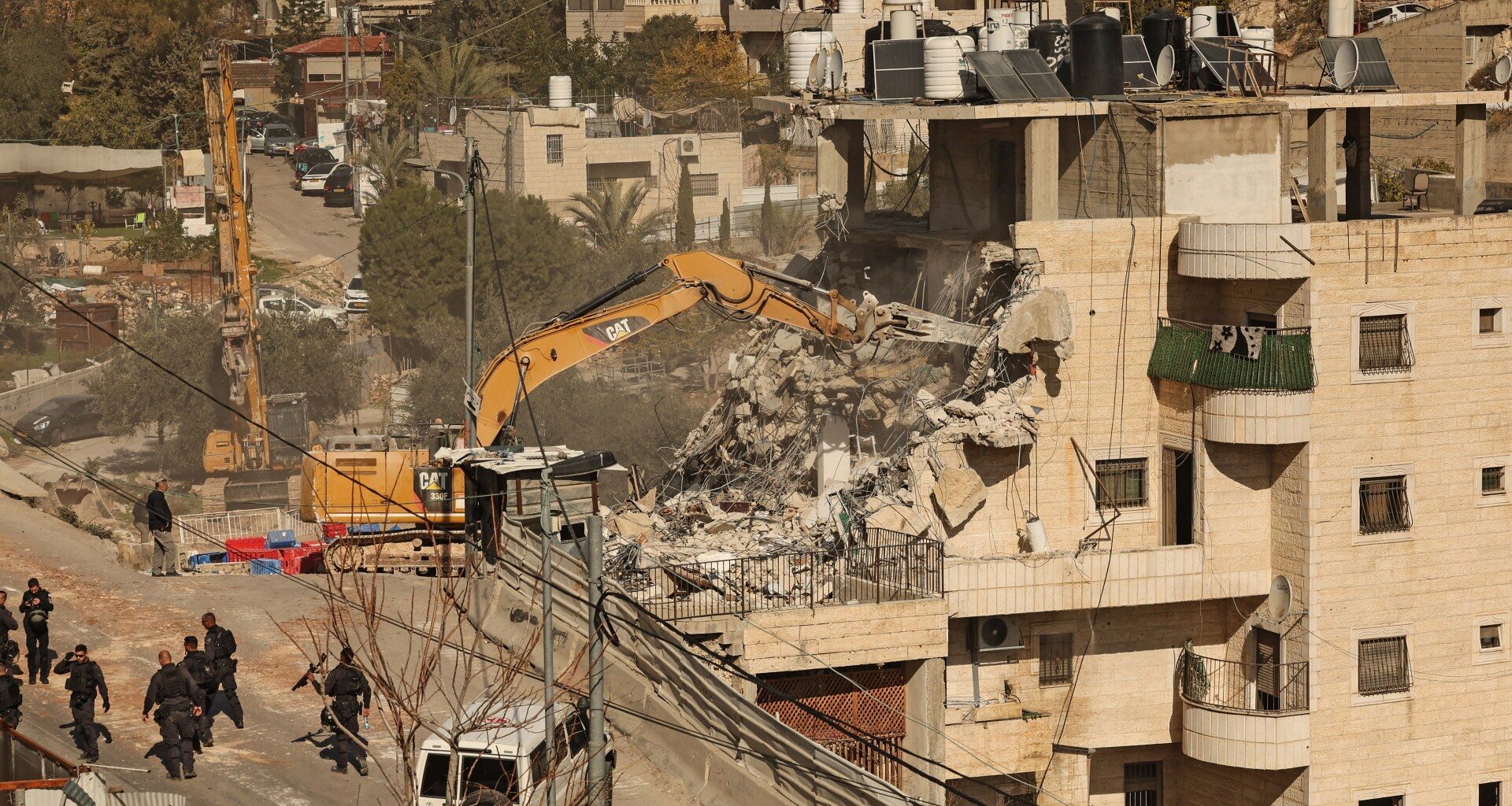 Israeli forces demolish shops in raids near occupied East Jerusalem | Israel-Palestine conflict News