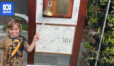 Given the all clear from cancer, 6yo Laylah celebrates by ringing the bell at the Queensland Children's Hospital