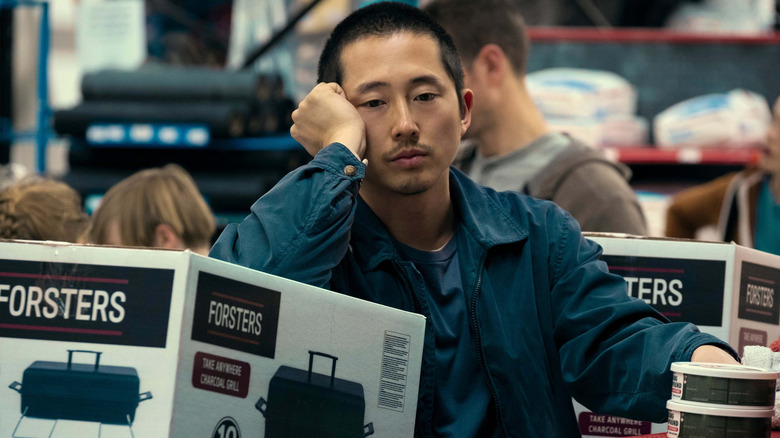 Danny (Steven Yeun) looking disinterested on Beef