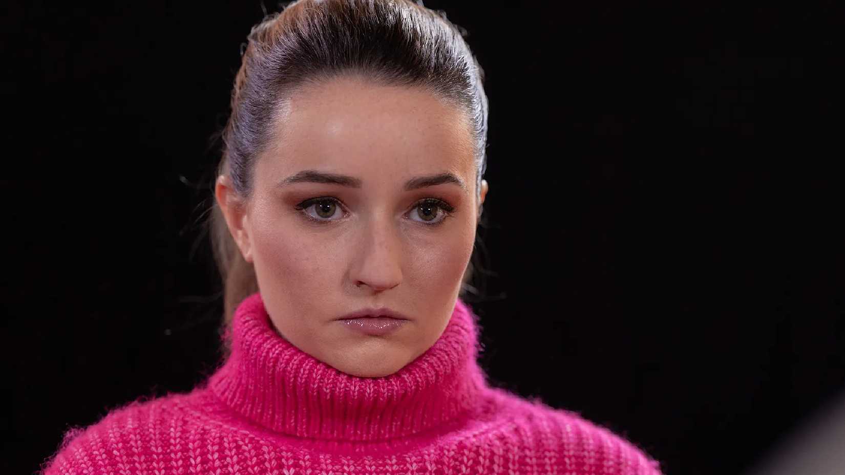 Belle Gibson wears a pink turtle neck in Apple Cider Vinegar