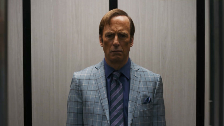 Saul Goodman (Bob Odenkirk) stands grimly in an elevator in Better Call Saul