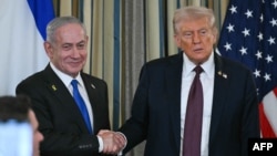 US President Donald Trump (right) and Israeli Prime Minister Benjamin Netanyahu shake hands at the conclusion of a joint press conference in the White House in Washington, D.C. in September.