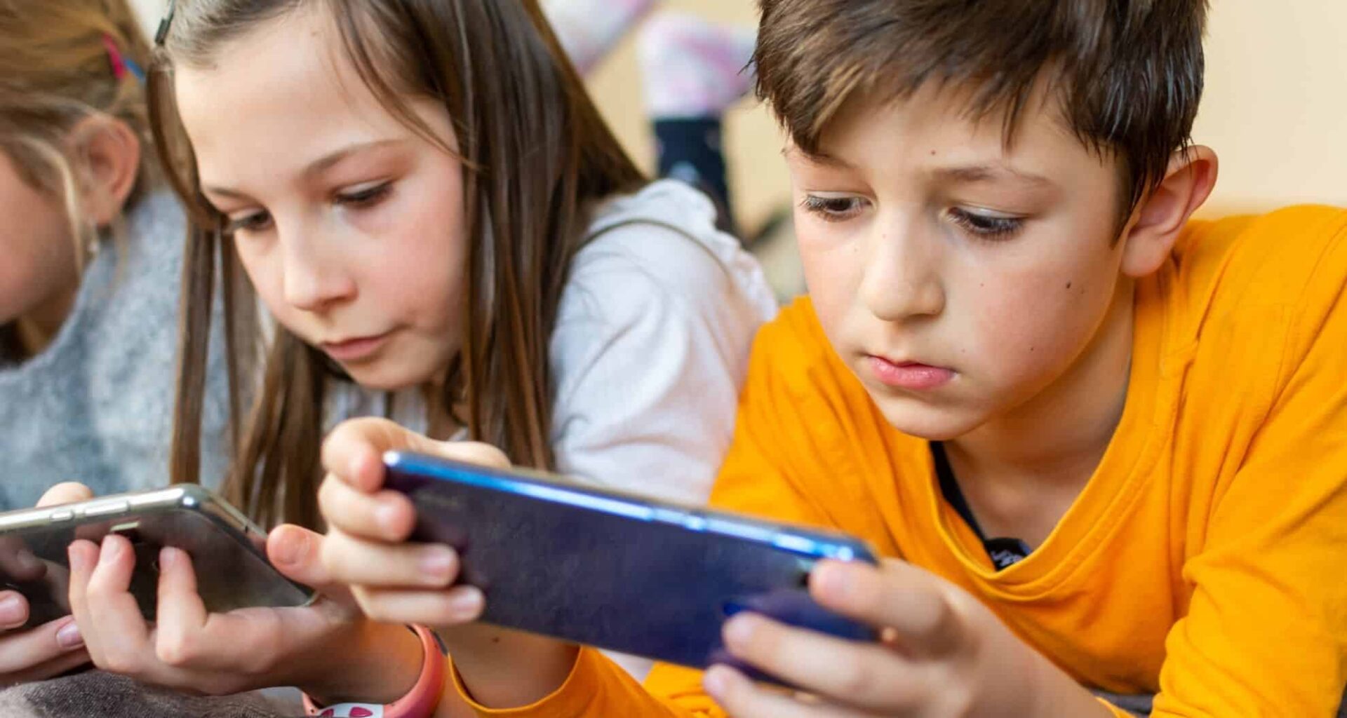 Childrens Using Their Smartphones