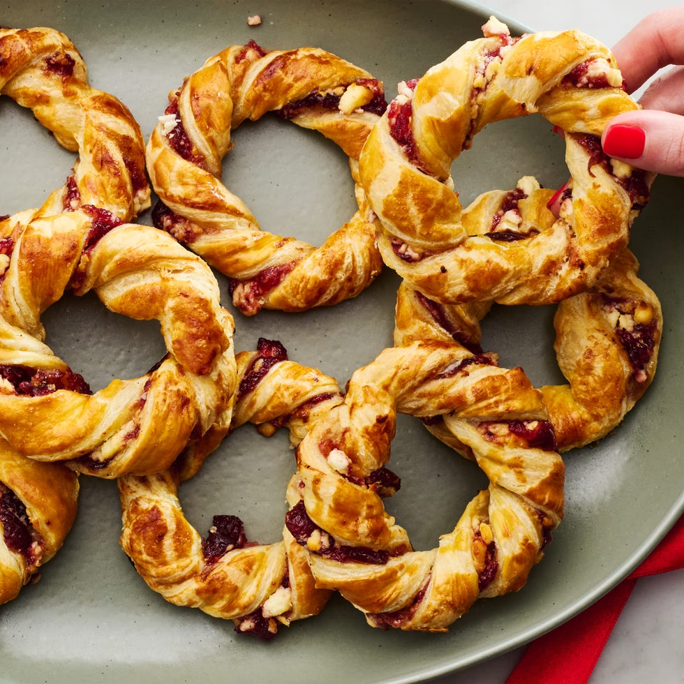puff pastry filled with cranberry and feta shaped into wreaths