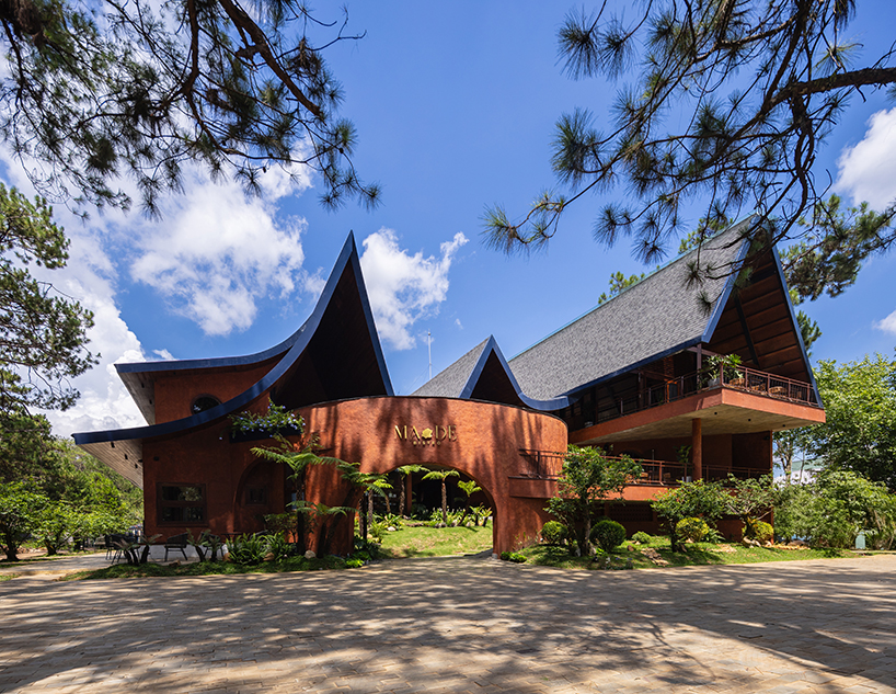 interlinked peaks shape bistro’s rhythmic canopy echoing mountain ridge in vietnam