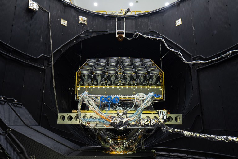 A test version of the payload module of ESA's exoplanet-detecting Plato spacecraft being tested within a thermal vacuum chamber.