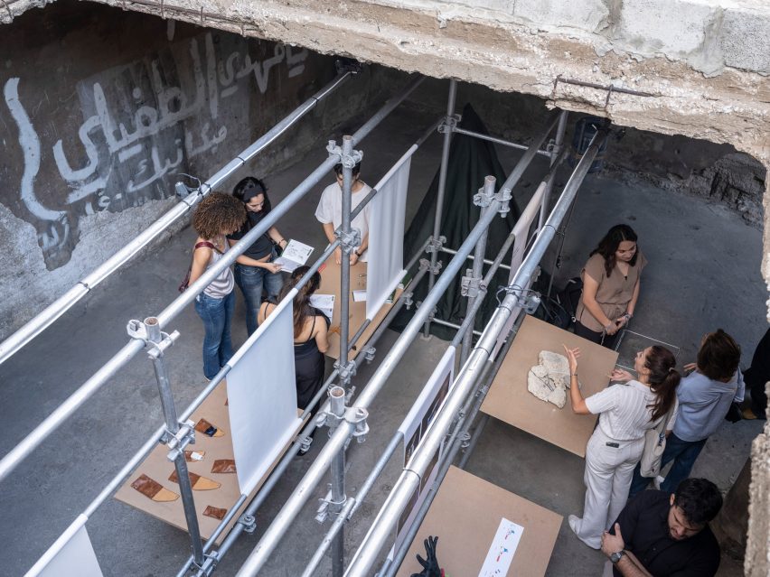 Photo of products displayed on metal scaffolding for an exhibition