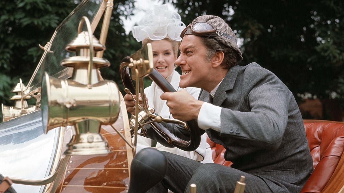 Dick Van Dyke driving an automobile in "Chitty Chitty Bang Bang."