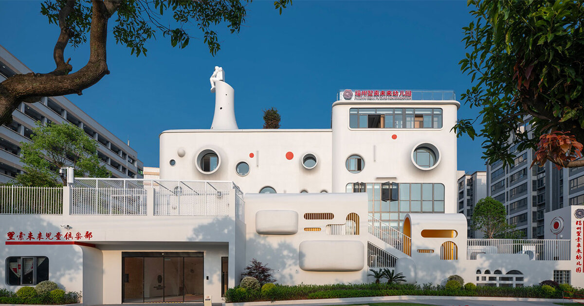 dika design shapes playful interstellar kindergarten crowned by astronaut sculpture