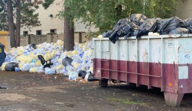 Heaps of trash bags left outside soon-to-be shuttered Portland hospital