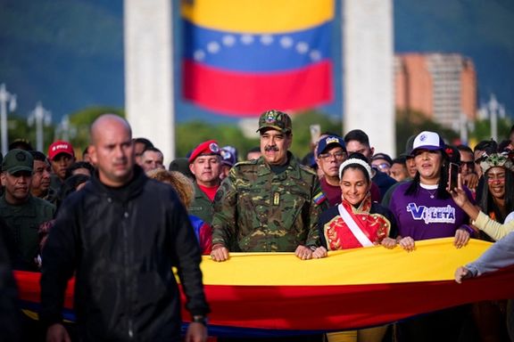 Venezuela's President Nicolas Maduro marches in a rally against a possible escalation of US actions toward the country, in Caracas, Venezuela, November 25, 2025. 
